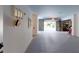 Spacious garage with gray epoxy floors, white walls, storage, and open view to the backyard at 2312 Rushland Landing Rd, Johns Island, SC 29455