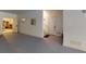 Spacious garage interior with access door, stairway, and painted floor at 2312 Rushland Landing Rd, Johns Island, SC 29455