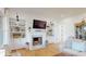 Living room showcasing a cozy fireplace, built-in shelving, and a decorative marble hearth at 2312 Rushland Landing Rd, Johns Island, SC 29455