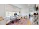 Inviting office space features hardwood floors, a desk, and natural light, creating a serene work environment at 2312 Rushland Landing Rd, Johns Island, SC 29455