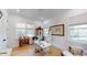Office space with hardwood floors, two windows, and unique decor, perfect for a creative workspace at 2312 Rushland Landing Rd, Johns Island, SC 29455