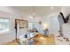 Bright office with hardwood floors, two windows, and a unique desk, creating an inspiring workspace at 2312 Rushland Landing Rd, Johns Island, SC 29455