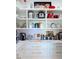 Well-stocked pantry with open shelving, marble countertops, and modern appliances at 2312 Rushland Landing Rd, Johns Island, SC 29455