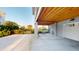 Under house parking area with concrete floors, attached garage, and patio seating at 2312 Rushland Landing Rd, Johns Island, SC 29455