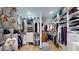 Spacious walk-in closet with custom shelving and hardwood floors, perfect for organized storage and style at 2312 Rushland Landing Rd, Johns Island, SC 29455