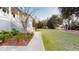 A sidewalk leading to the home's front entrance with lush landscaping at 2312 Rushland Landing Rd, Johns Island, SC 29455