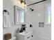 Renovated bathroom features subway tile, new vanity, and modern fixtures at 2313 Kent Ave, North Charleston, SC 29405