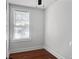 Bedroom offers a window, wood flooring, and neutral paint at 2313 Kent Ave, North Charleston, SC 29405