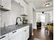 Open floor plan shows kitchen with granite countertops, and stainless appliances at 2313 Kent Ave, North Charleston, SC 29405