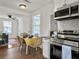 Open floor plan shows kitchen with stainless appliances and eat-in dining area at 2313 Kent Ave, North Charleston, SC 29405