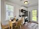 Bright kitchen with stainless steel appliances, ample cabinet space, and a dining table perfect for everyday meals at 2313 Kent Ave, North Charleston, SC 29405