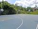 Bright blue community basketball court with trees and lush landscaping at 2340 Salt Wind Way, Mount Pleasant, SC 29466