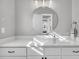 Bright bathroom with white cabinets, quartz countertop, and rectangular vessel sink at 2340 Salt Wind Way, Mount Pleasant, SC 29466