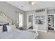 Bedroom boasts beach-themed decor, connecting door to bathroom and hallway at 2340 Salt Wind Way, Mount Pleasant, SC 29466