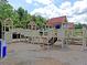 Charming playground area with slides, climbing wall, and playhouses at 2340 Salt Wind Way, Mount Pleasant, SC 29466
