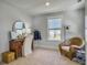 Bright bedroom with natural light, vanity and chair, and wicker seat at 2823 Dearmin Dr, Mount Pleasant, SC 29466