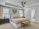 Bright bedroom with natural light, tray ceilings, ceiling fan, and stylish furniture at 2823 Dearmin Dr, Mount Pleasant, SC 29466
