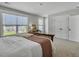 Cozy bedroom featuring soft bedding, natural light, and convenient access to closet at 2823 Dearmin Dr, Mount Pleasant, SC 29466
