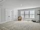 Large bonus room with double closets, three windows and pull-up bar at 2823 Dearmin Dr, Mount Pleasant, SC 29466
