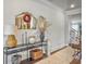 Stylish entryway showcasing a decorative mirror, modern console table, and hardwood floors at 2823 Dearmin Dr, Mount Pleasant, SC 29466