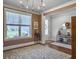Well-lit entryway with hardwood floors, view of the front door and stylish console table at 2823 Dearmin Dr, Mount Pleasant, SC 29466