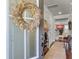 Inviting front door with stylish wreath, leading into a beautifully decorated foyer at 2823 Dearmin Dr, Mount Pleasant, SC 29466