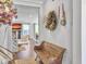 Hallway with decorative wall accents leading to the living room and dining area at 2823 Dearmin Dr, Mount Pleasant, SC 29466