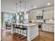 Bright, modern kitchen with stainless steel appliances, large island, and dining area at 2823 Dearmin Dr, Mount Pleasant, SC 29466
