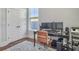 Cozy office with an antique desk, a modern computer setup, and a window view to the outside at 2823 Dearmin Dr, Mount Pleasant, SC 29466