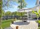 An outdoor patio features brickwork and a large patio umbrella at 2823 Dearmin Dr, Mount Pleasant, SC 29466