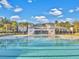 Large outdoor community pool featuring pristine water, lap lanes, and well-maintained surrounding areas under a sunny sky at 2823 Dearmin Dr, Mount Pleasant, SC 29466