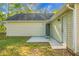 Backyard featuring a small patio and a closed white wooden door at 301 Huntington Ct, Hanahan, SC 29410