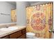 Bathroom with floral shower curtain, vanity sink, and toilet at 301 Huntington Ct, Hanahan, SC 29410
