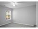This bedroom has gray walls, ceiling fan, carpet and a window at 301 Huntington Ct, Hanahan, SC 29410