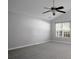 Bright bedroom featuring neutral walls, carpet flooring, a ceiling fan, and a window at 301 Huntington Ct, Hanahan, SC 29410