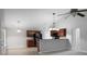 Open kitchen showcasing dark cabinets, modern appliances, and stylish pendant lighting at 301 Huntington Ct, Hanahan, SC 29410