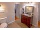 Bright bathroom showcasing modern fixtures, granite countertop vanity, and a separate toilet area at 306 Fairlawn Drive, Moncks Corner, SC 29461