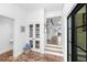 Bright hallway featuring beautiful brick flooring, white walls and storage at 3060 Bohicket Rd, Johns Island, SC 29455