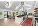 Expansive kitchen features a large island, stainless steel appliances, and an open layout at 3060 Bohicket Rd, Johns Island, SC 29455