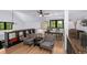 Stylish upstairs loft with vaulted ceilings, hardwood floors, and elegant furnishings at 3060 Bohicket Rd, Johns Island, SC 29455