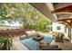 Charming outdoor patio offering serene views of the surrounding nature and landscape at 3060 Bohicket Rd, Johns Island, SC 29455