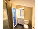 Bright bathroom featuring a shower with glass door and white vanity at 307 Fairington Dr, Summerville, SC 29485