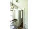 Well-lit bathroom features granite counters, decorative lighting, and convenient access to adjacent rooms at 307 Fairington Dr, Summerville, SC 29485