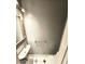 Powder room featuring sleek fixtures, decorative mirror and tile floor at 307 Fairington Dr, Summerville, SC 29485