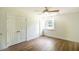 Bright bedroom featuring hardwood floors, a closet and a window at 307 Fairington Dr, Summerville, SC 29485