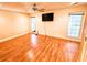 Spacious bedroom with hardwood floors, natural light, and a ceiling fan at 307 Fairington Dr, Summerville, SC 29485