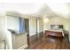 Bedroom features wood floors, ceiling fan and closet with striped curtain at 307 Fairington Dr, Summerville, SC 29485