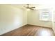 Bedroom featuring hardwood floors, a ceiling fan, and a window at 307 Fairington Dr, Summerville, SC 29485
