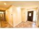 Inviting entryway with tile floors and natural light creates a warm and welcoming ambiance at 307 Fairington Dr, Summerville, SC 29485