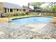 Private in-ground pool with patio offers a refreshing backyard oasis for summer fun and relaxation at 307 Fairington Dr, Summerville, SC 29485
